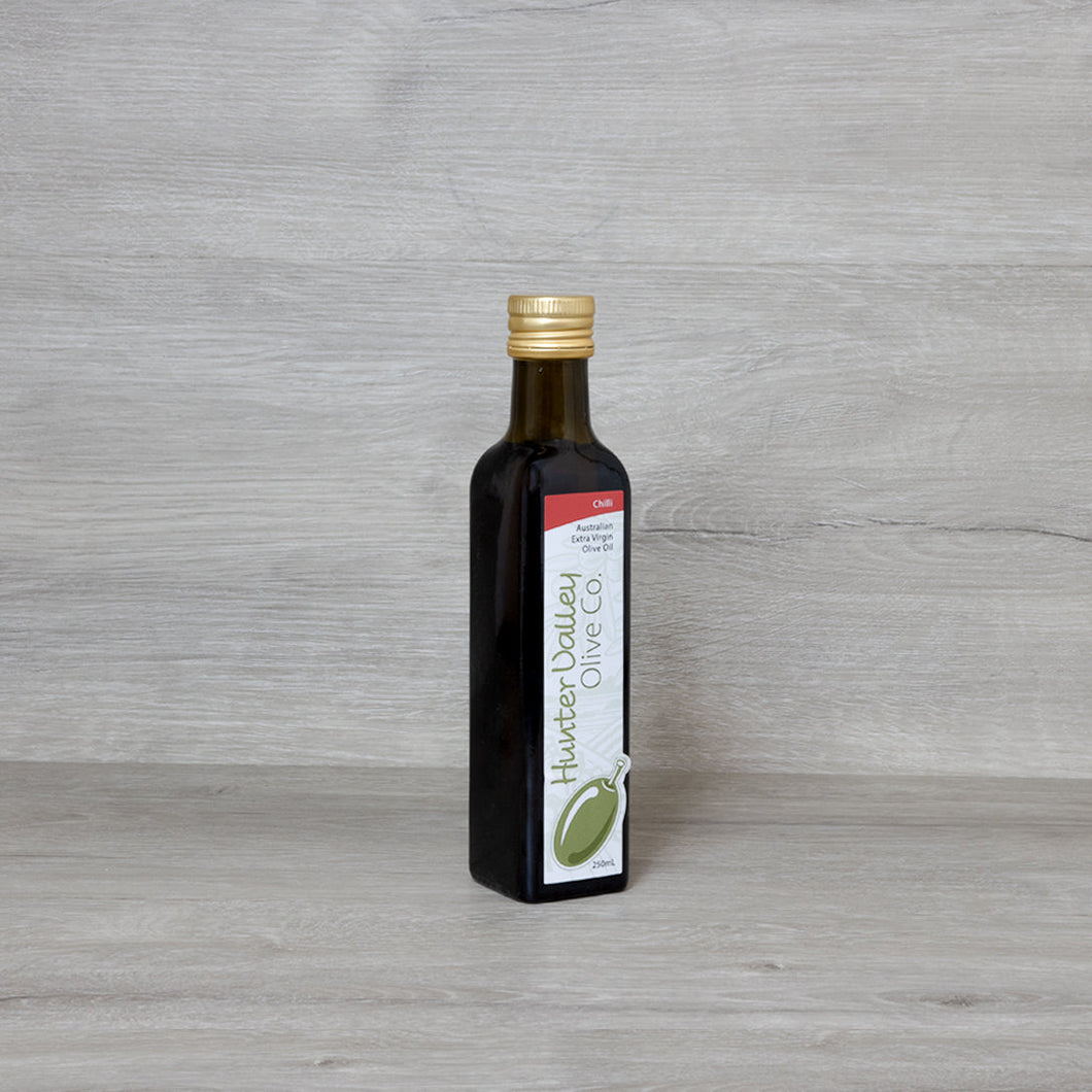 250ml Green glass bottle of Hunter Valley Olive Co. Chilli flavoured Australian Extra Virgin Olive Oil.